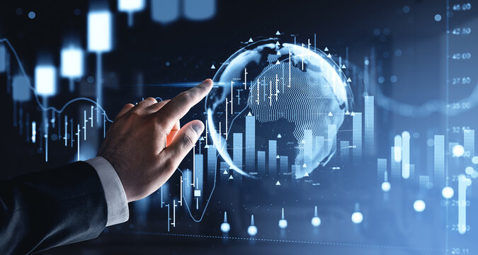 Business hand touching global financial chart interface with digital forex market indicators and rising stock graph elements in futuristic concept.