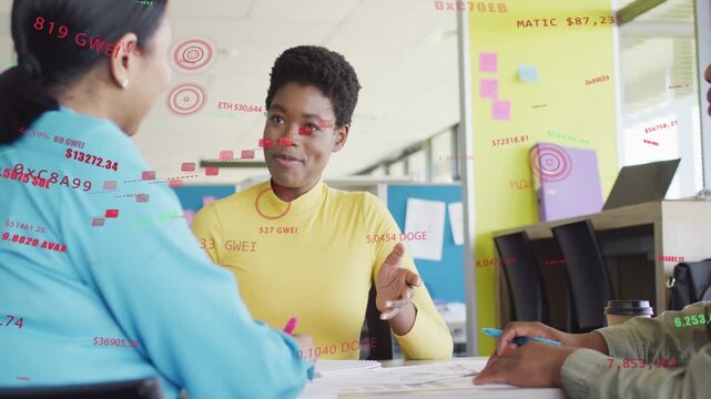 Woman in yellow leading meeting, speaking and gesturing, showing floating crypto metrics over docs