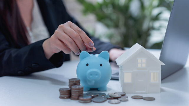 Piggy bank with house financial concept, loan and investment planning, wealth management, money savings box, real estate finance and insurance protection strategy.