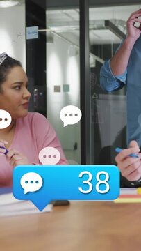 Vertical video: Seated woman watching man calling, new comments raising chat counts for work