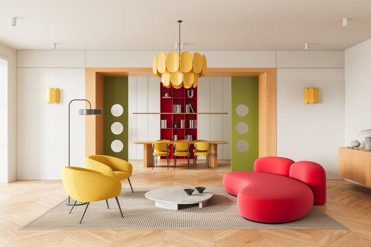 Modern colorful living room with bold furniture and geometric accents.