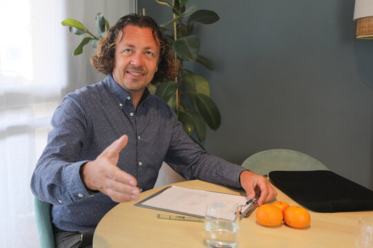 Business Meeting Handshake Offer