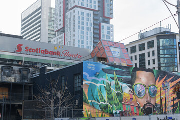 Fototapeta premium funky mural and sign at Scotiabank Theatre 259 Richmond St W, Toronto - looking northwest from Nelson St