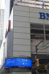 Obraz premium exterior of First Canadian Place, headquarters of BMO Group, with LED Financial Ticker or a Curved Ribbon Display, King and Bay, Toronto