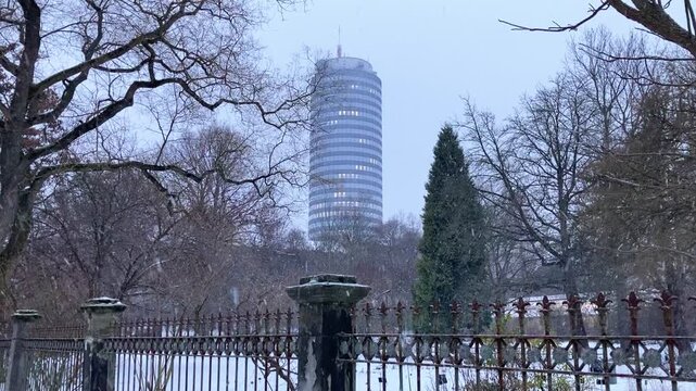 Jena, Germany, winter season, snowfall, botanical garden view and Jentower