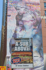 Naklejka premium roadside billboard advertisement for Jersey Mike's at Union Station at parking lot near Revery Toronto Downtown, Adelaide St W, Toronto