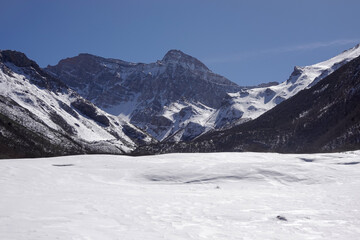 Fototapeta premium Winter Basin And Frozen Mountain Lake
