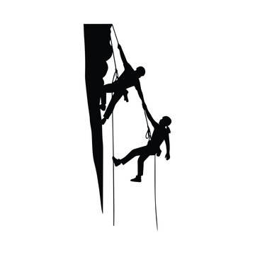 Two climbers helping each other while scaling a steep rock face