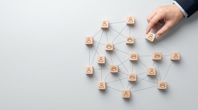Organizational network structure with connected people icons on wooden blocks, showing team collaboration, stakeholder mapping, social graph, and business communication on a light background