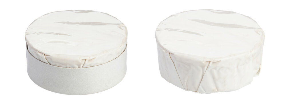 wo round camembert or brie cheese heads in white paper packaging isolated on white
