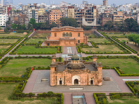 Dhaka, Bangladesh - 08 March 2026: Aerial view of Lalbagh Fort featuring the Tomb of Bibi Pari and manicured gardens with the dense urban skyline in the background.