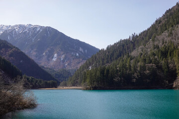 Naklejka premium Calm Blue Water In Mountain Basin