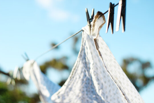 Washing hung on sunlit line