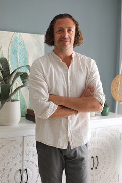 Man With Crossed Arms Indoors