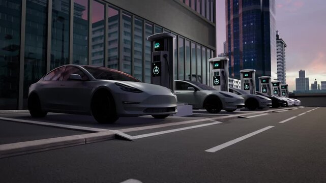 Row Of Electric Cars Charging At Modern Outdoor Ev Station In Urban Parking Lot