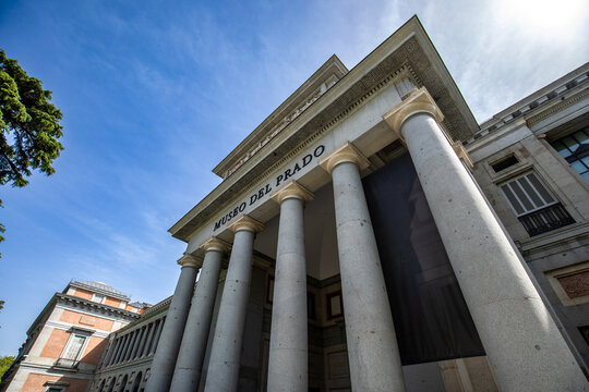 Facade of the Prado National Museum in Madrid, Spain, in midday light