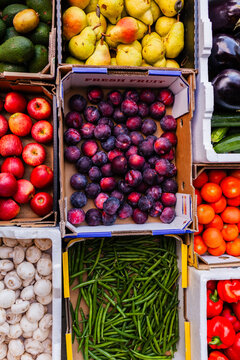 Colourful fresh organic fruit and veg straight from farmers in boxes delivered to hub