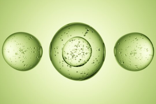 Green cells with nucleus and bubbles, biology concept