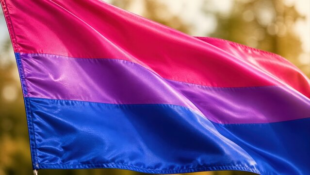 Bisexual Pride Flag Waving in Warm Sunlight