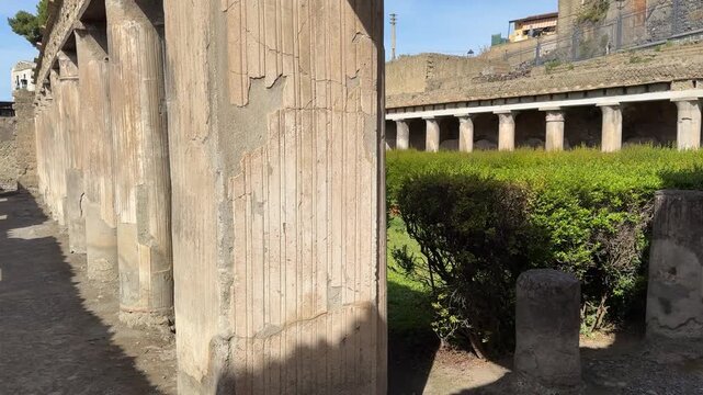 Ancient Roman Villa Columns Lining the Path to the Main Garden