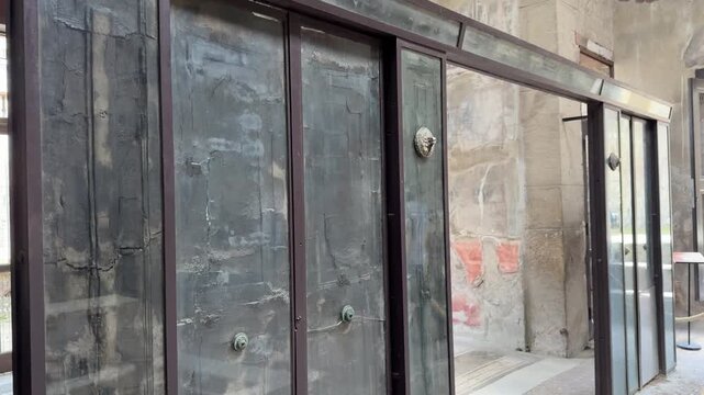 Ancient Carbonized Wooden Sliding Doors Preserved in a Herculaneum Villa