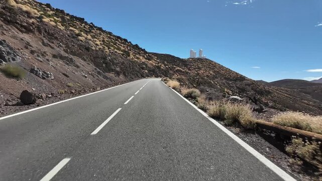 Driving mountain road towards teide observatory in tenerife