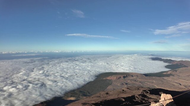 Amazing mountain landscape view above the clouds