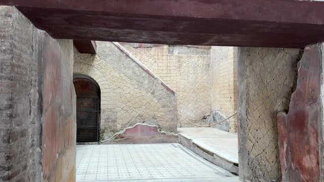 Preserved Room With Stairs and Painted Walls in a Roman Villa of Herculaneum
