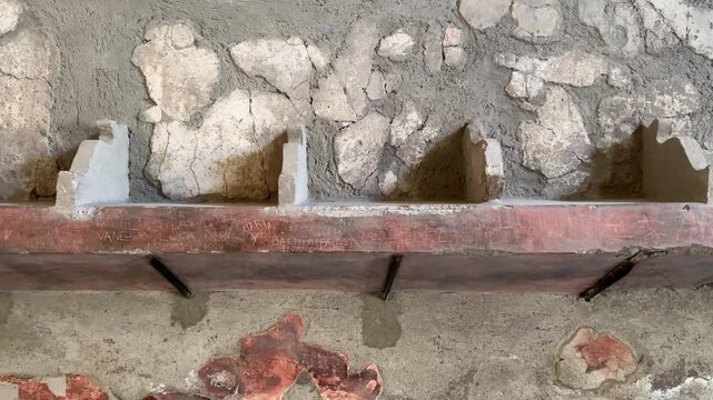 Ancient Stone Shelving and Niches Inside the Roman Baths of Herculaneum