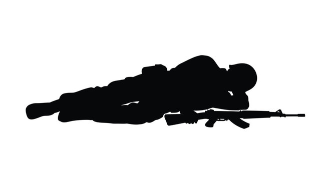 Soldier lying down with a rifle.