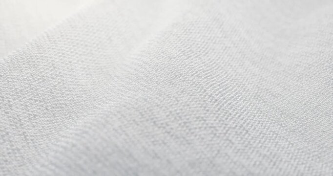 Soft white woven fabric texture background looping animation