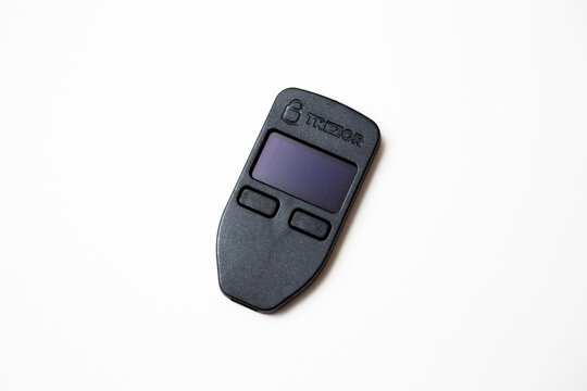 Odesa, Ukraine - April 7, 2026: Black Trezor One hardware crypto wallet isolated on white background