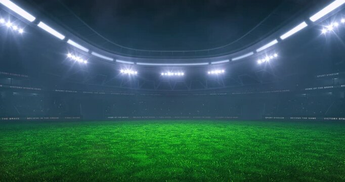 Empty grass field at a sports stadium in foggy weather with shining floodlights and fans ready for an upcoming nighttime sports event. Loopable professional sports advertisement video background.