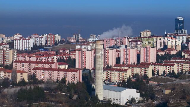 Footage of toxic waste and smoke coming out of the chimneys of industrial facilities and polluting the environment.