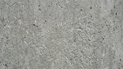 Fototapeta premium Fiber-Reinforced Concrete with Visible Polypropylene Strands in Gray Matrix
