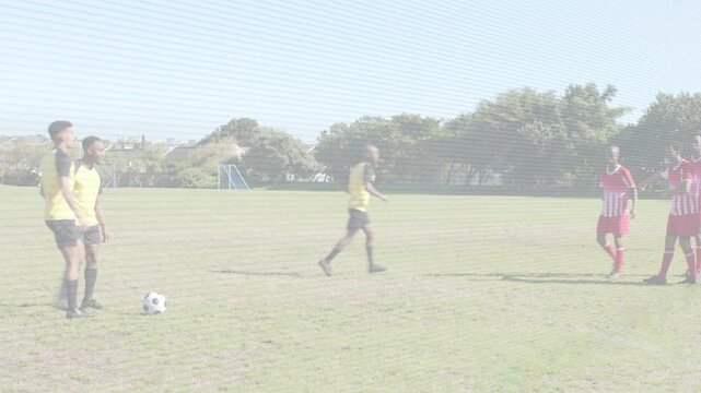 Yellow players placing ball, running short approach, animated lines tracing path over sports pitch