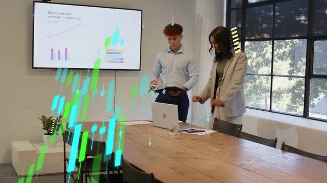 Business woman leaning over laptop, man flipping reports, finalizing deck with candlestick overlay