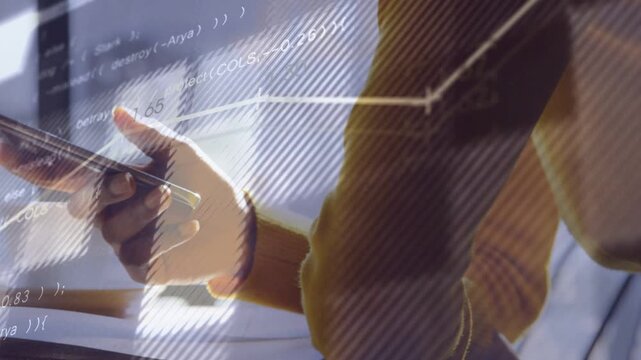 Leaning, yellow-sweater user bringing smartphone into view, tapping and swiping, reviewing charts