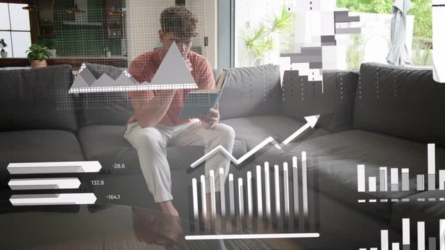 Man sitting on sofa tapping tablet, launching animated finance charts and gauges, analyzing data