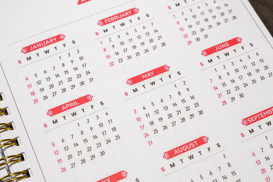 A detailed view of a calendar page displaying months from January to September, highlighting the dates prominently, suitable for planning and organization. Ideal for promotional materials.