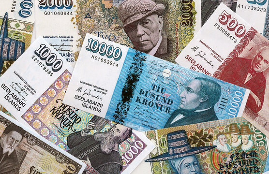 Icelandic krona money banknotes pile on table. Iceland bills of ISK currency. Concept of economy