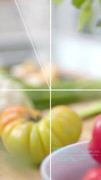 Vertical video: On play ring rotating, pivoting and sliding light streaks, revealing cup and fruit