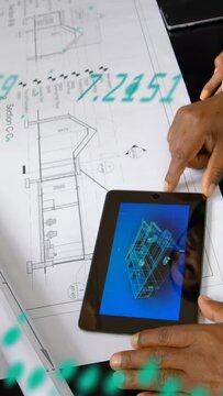 Vertical video: Architect tapping tablet tracing plan showing green overlay, comparing 3D wireframe