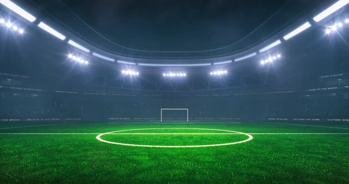 Football or soccer field at a sports stadium in foggy weather with shining floodlights and fans ready for an upcoming nighttime sports event. Loopable sports advertisement video background.