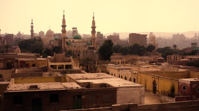 Cairo aerial view of the City of the Dead and garbage city. Smooth Steadicam shot from a slightly elevated perspective showing the contrast between Cairo&rsquo;s City of the Dead 