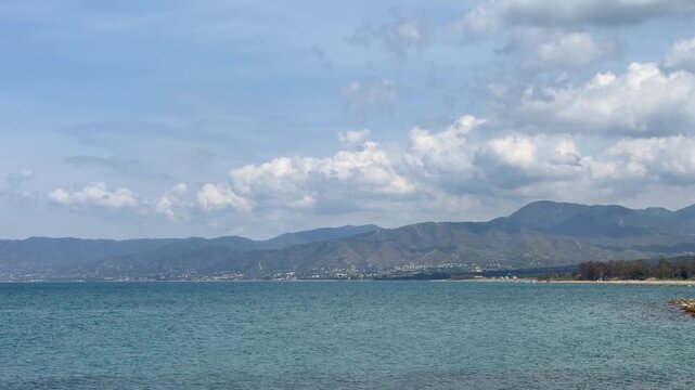 Mediterranean coast with blue water and open horizon, natural scenic view for travel industry visuals. Coastal scene highlights tourism, relaxation and environmental awareness themes. Cyprus Latchi
