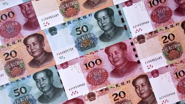 Chinese paper money, yuans in various denominations. China money as a business background for your design