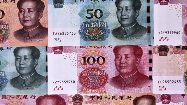 Chinese paper money, yuans in various denominations. China money as a business background for your design