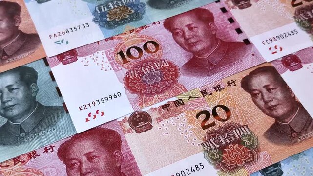 Chinese paper money, yuans in various denominations. China money as a business background for your design