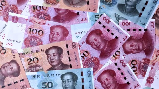 Chinese paper money, yuans in various denominations. China money as a business background for your design